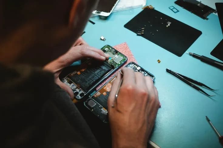 Technician working on phone